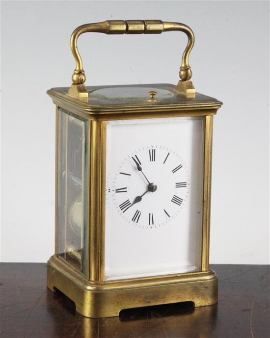 A French brass cased eight day repeating carriage clock, 4.75in ex. handle.